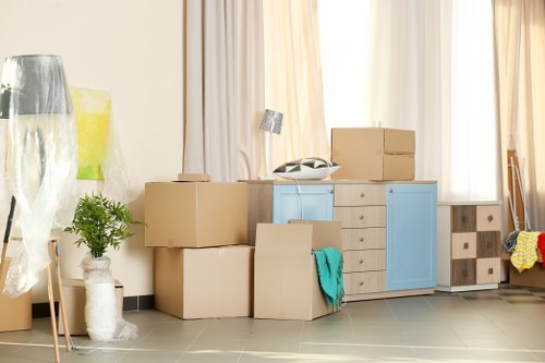 Removal team preparing household items for a local move