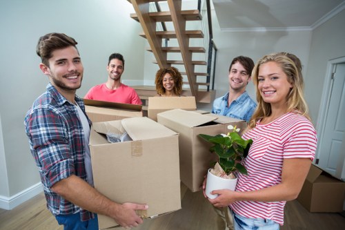 Local moving team handling a flat or apartment relocation