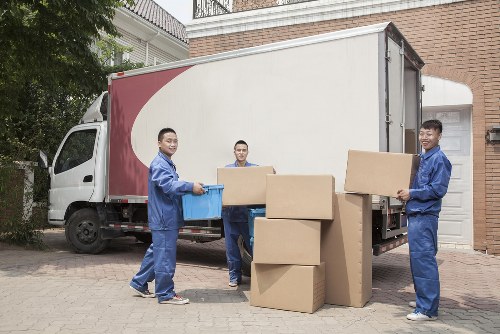 Local removal team preparing boxes for a home move