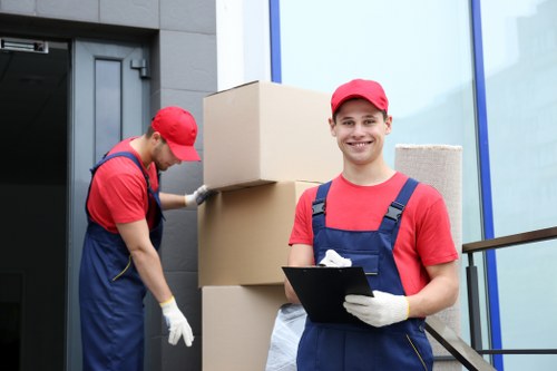Local removal team loading business items for an office relocation