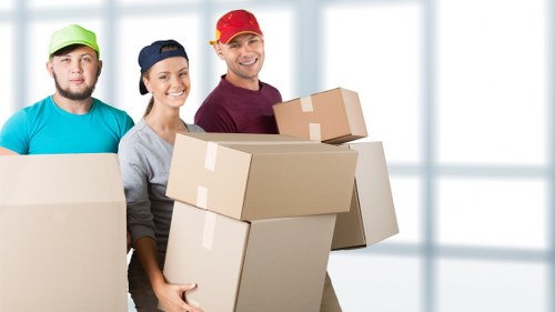 Office removal service preparing desks and equipment for transport