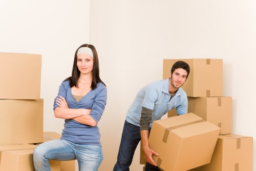 Loading furniture and boxes into a moving van