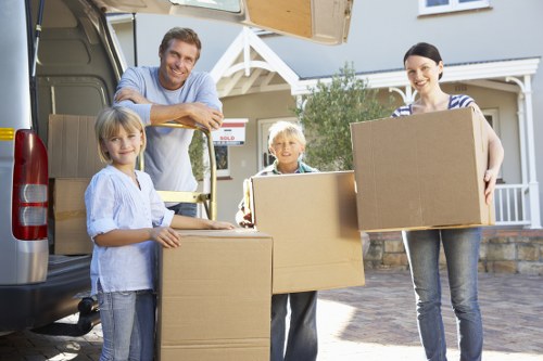 Loading furniture and boxes into a removal van for a local move