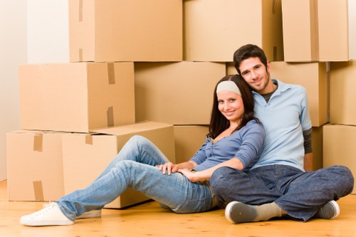 Packed furniture ready for pick-up by a professional movers team