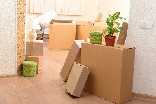 Van removal team handling items for a local move