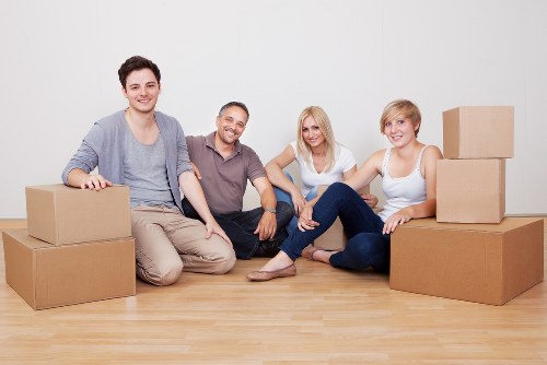 Boxes and household items being organised for transport