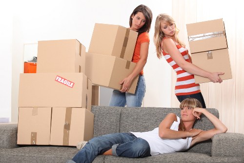 Removal service handling a flat move with careful lifting